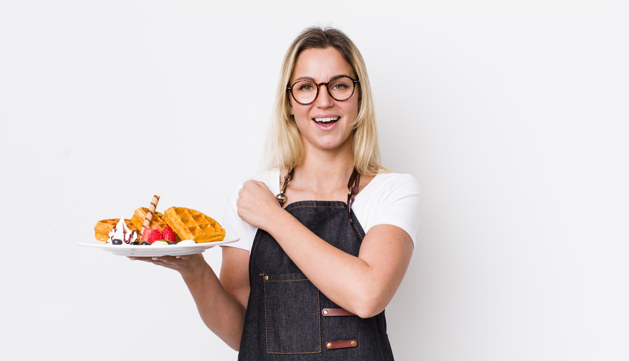Smiling participant with plated meal